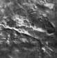 Фото, снятое станцией Марс-5, - часть разрушенного вала одного из марсианских кратеров.